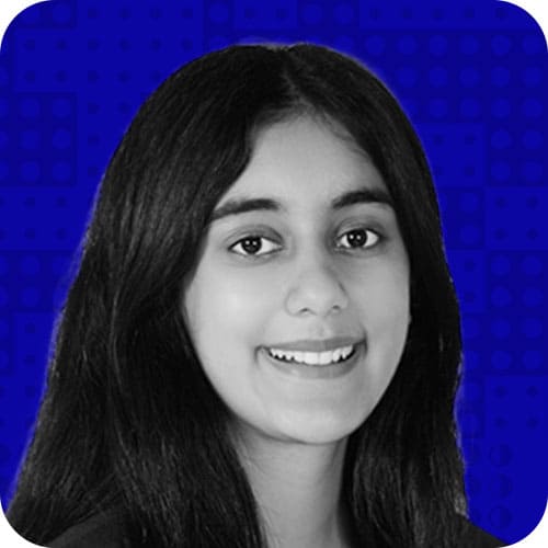 Ripple Foundation conference attendee smiling during the event, showcasing professional engagement in education and community initiatives.